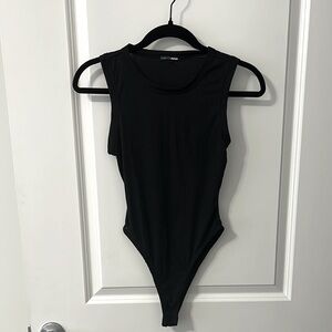 Comfortable and stylish women’s black bodysuit from Fashion Nova